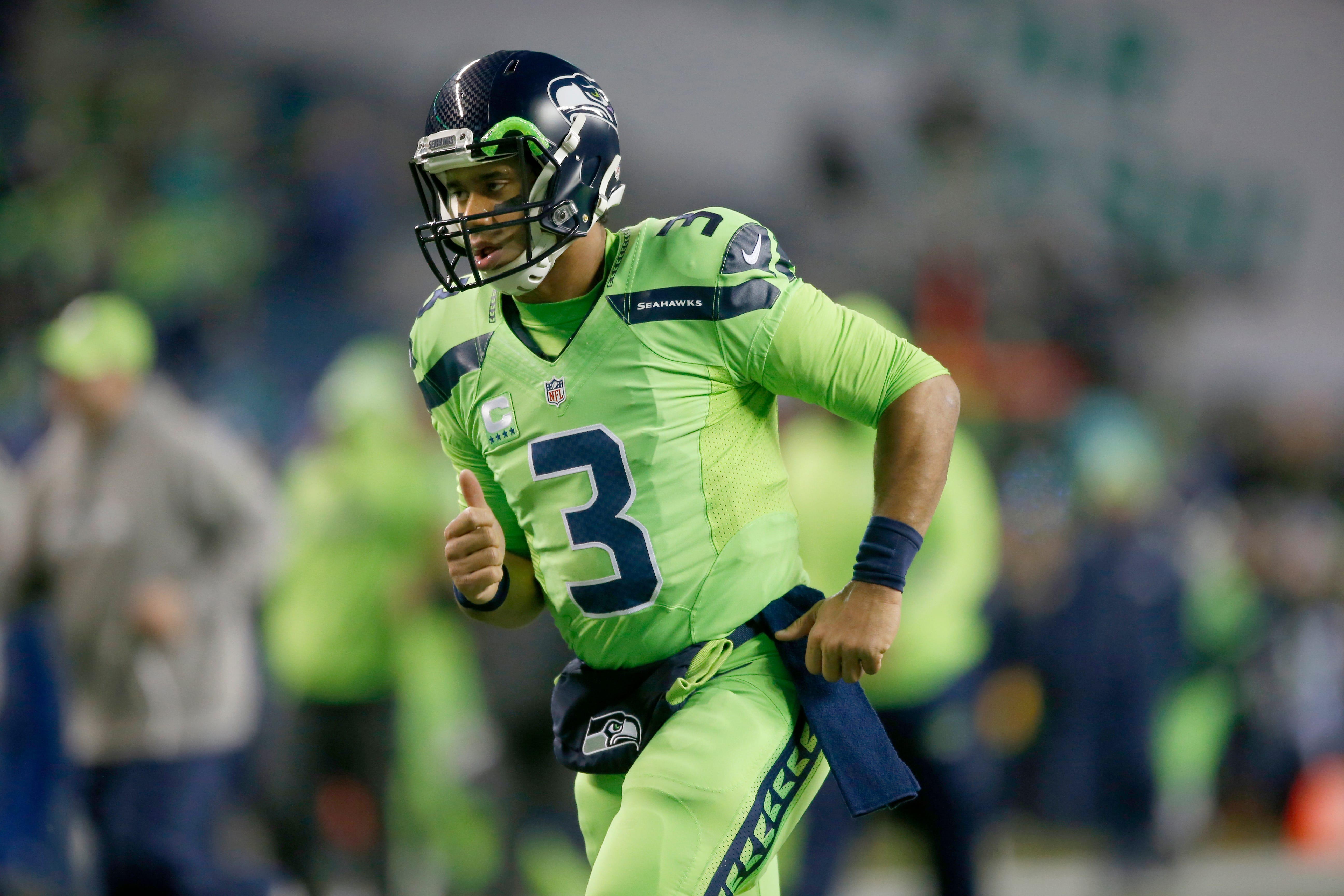 seahawks action green uniforms
